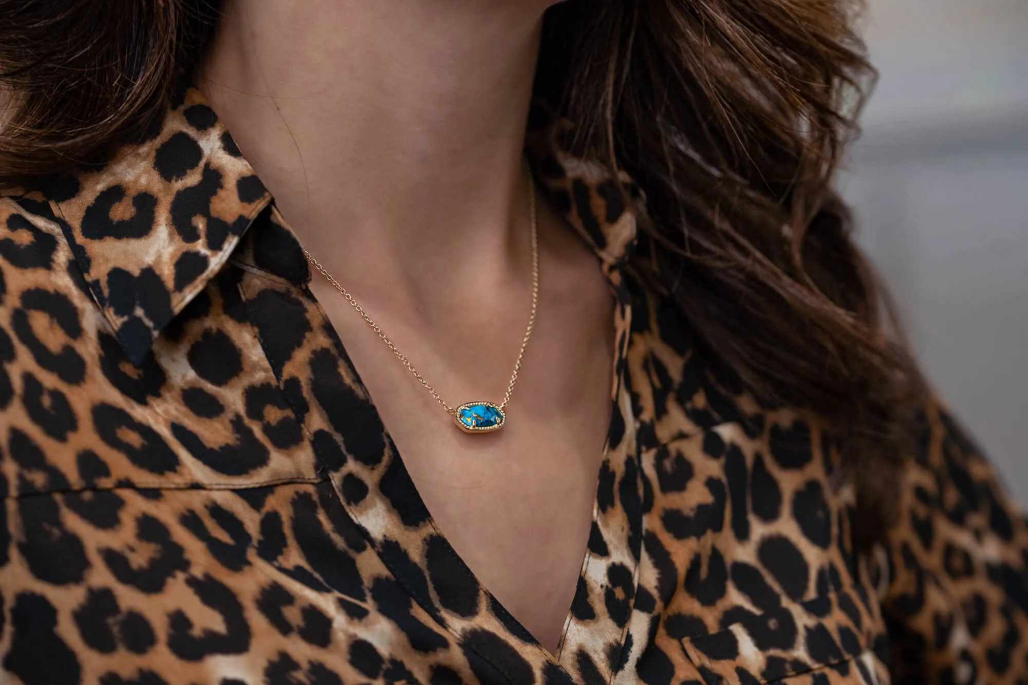 women wearing necklace