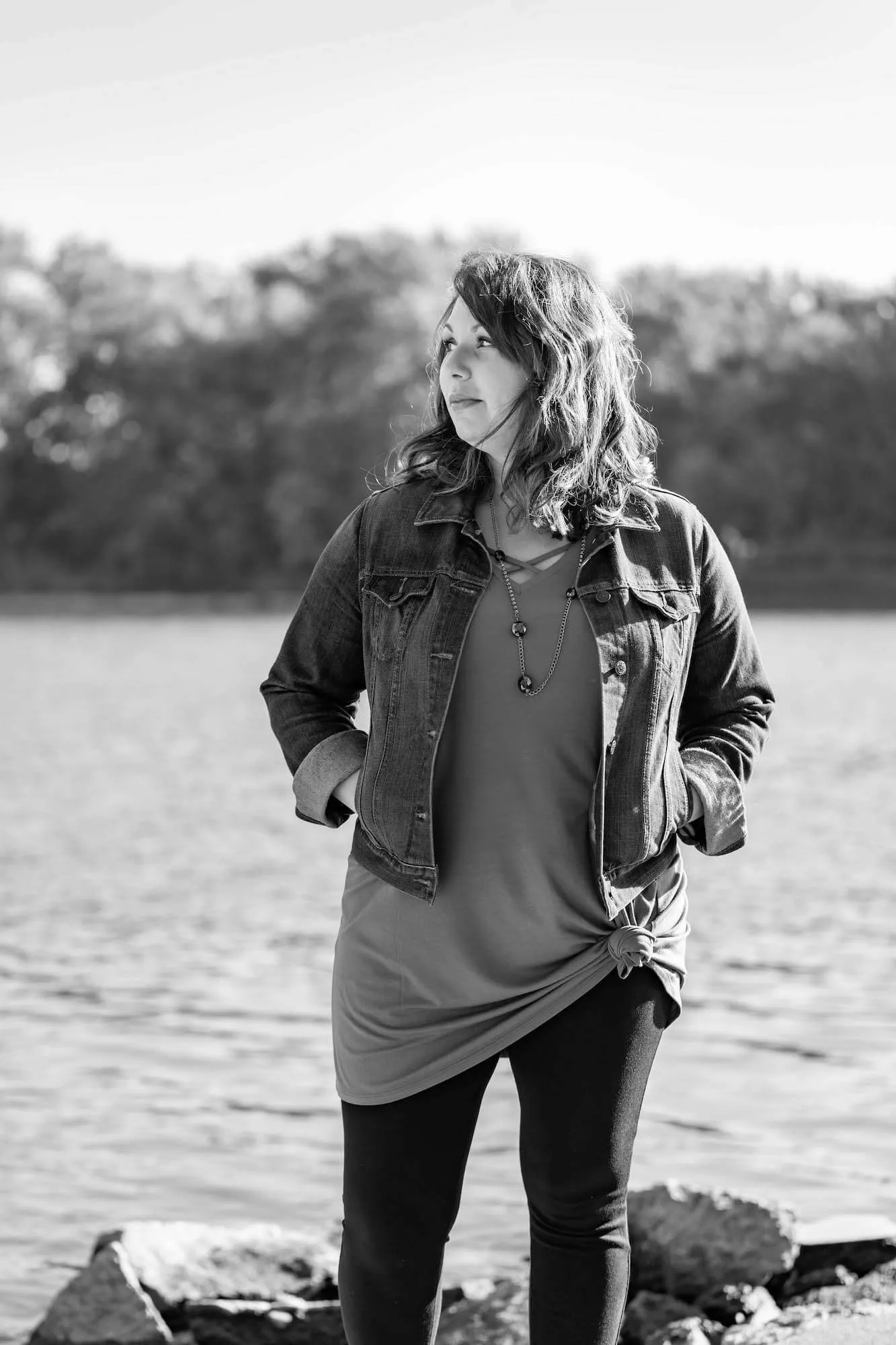 women next to river